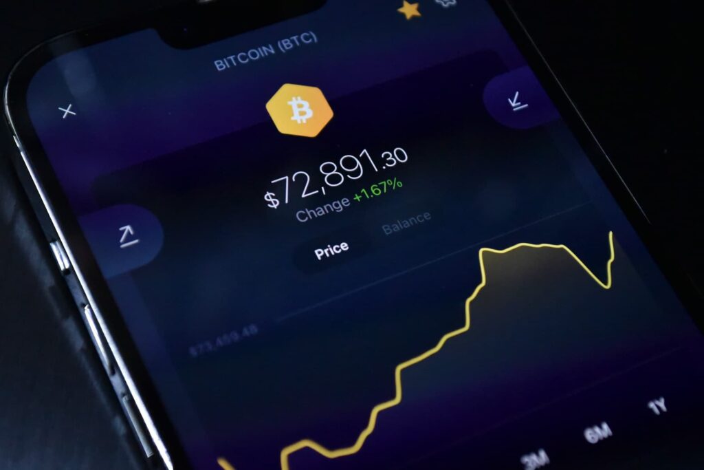 Cellphone displaying bitcoin on the screen