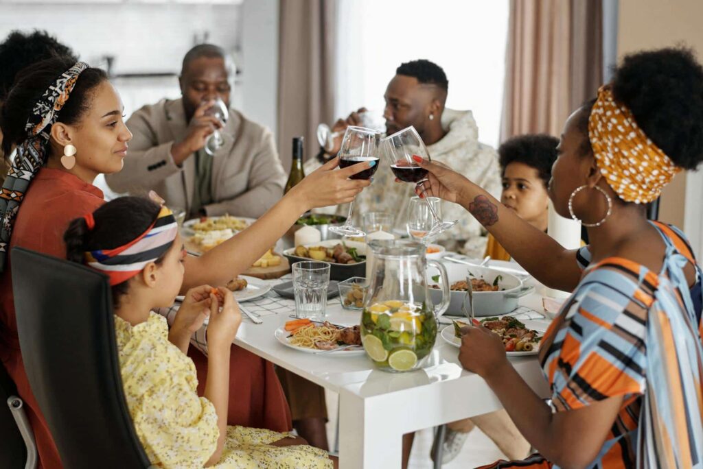 Family sitting at table eating