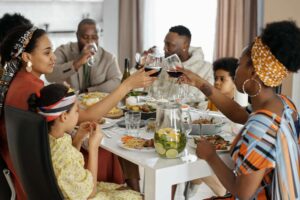 Family sitting at table eating